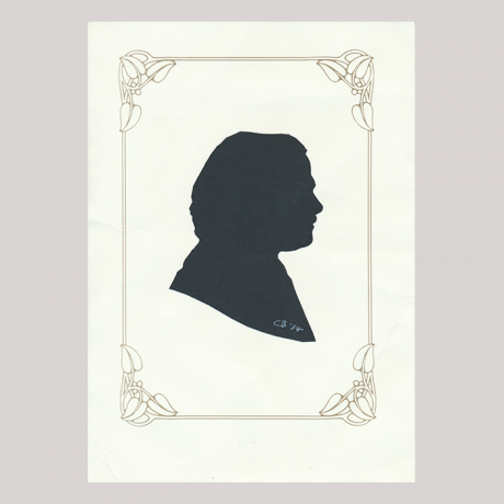 
        Front of silhouete, with man looking right, in frame.